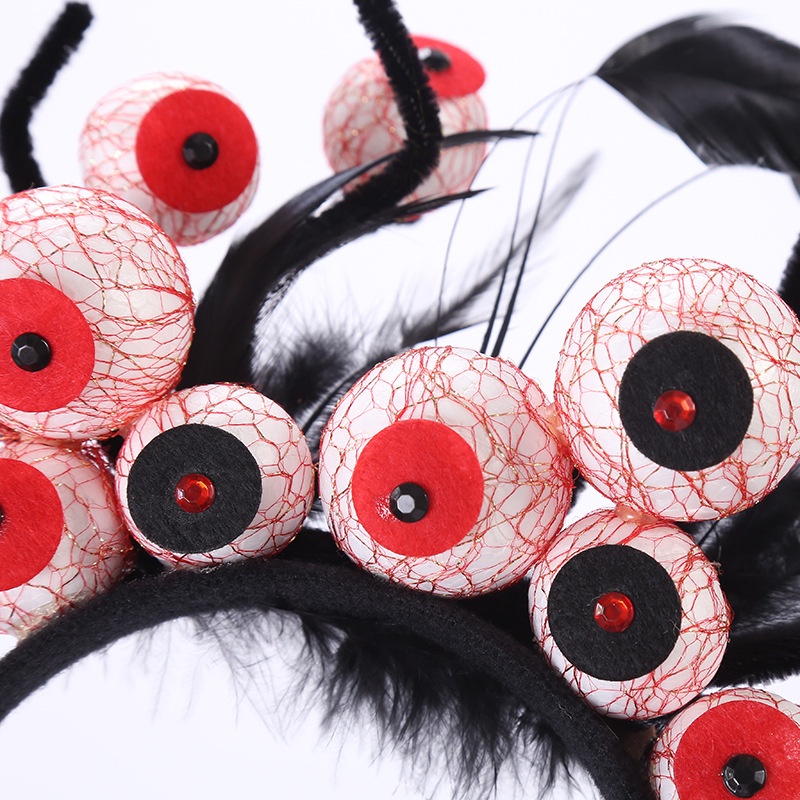Cài Tóc Hình Đôi Mắt Kinh Dị Đính Lông Vũ Đen Hóa Trang Halloween Cho Người Lớn Và Trẻ Em