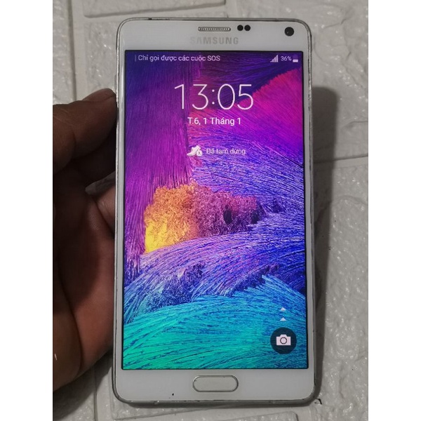 Điện thoại samsung galaxy note 4 dung ngon hết pin mới thay lưng màu đen như ảnh