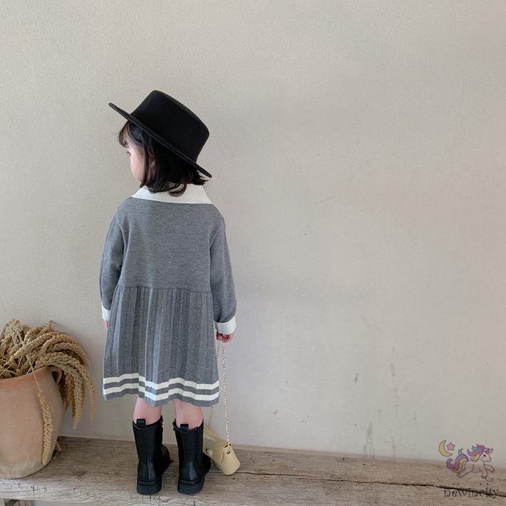 Đầm dài tay phối bèo nhún cho bé