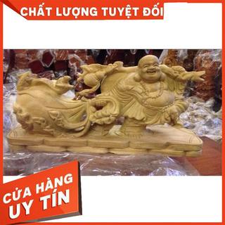 Tượng di lạc kéo bao tải tiền
