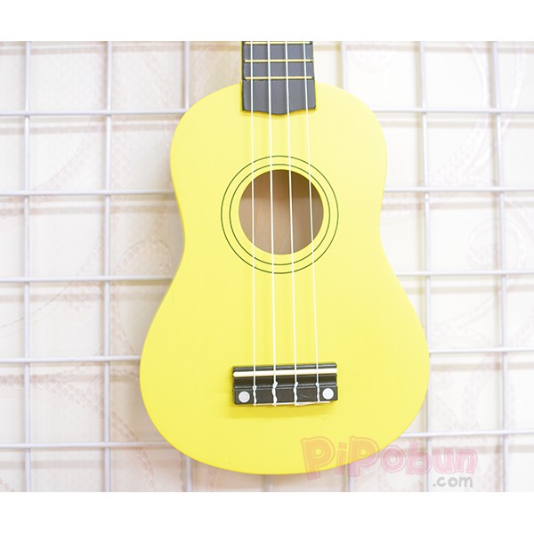 Đàn Ukulelele Yellow Soprano (Màu vàng) tặng kèm bao đựng + sách học + dây dự phòng + phím gảy