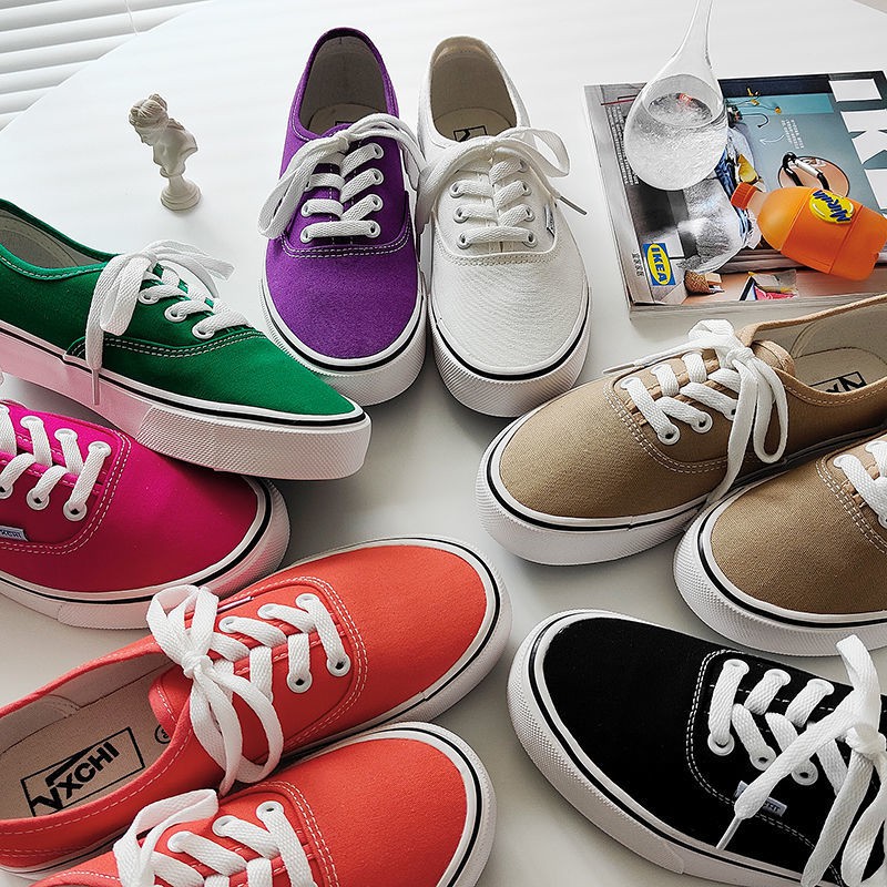 Giày vải canvas đế trắng thời trang đường phố cho nữ 2021