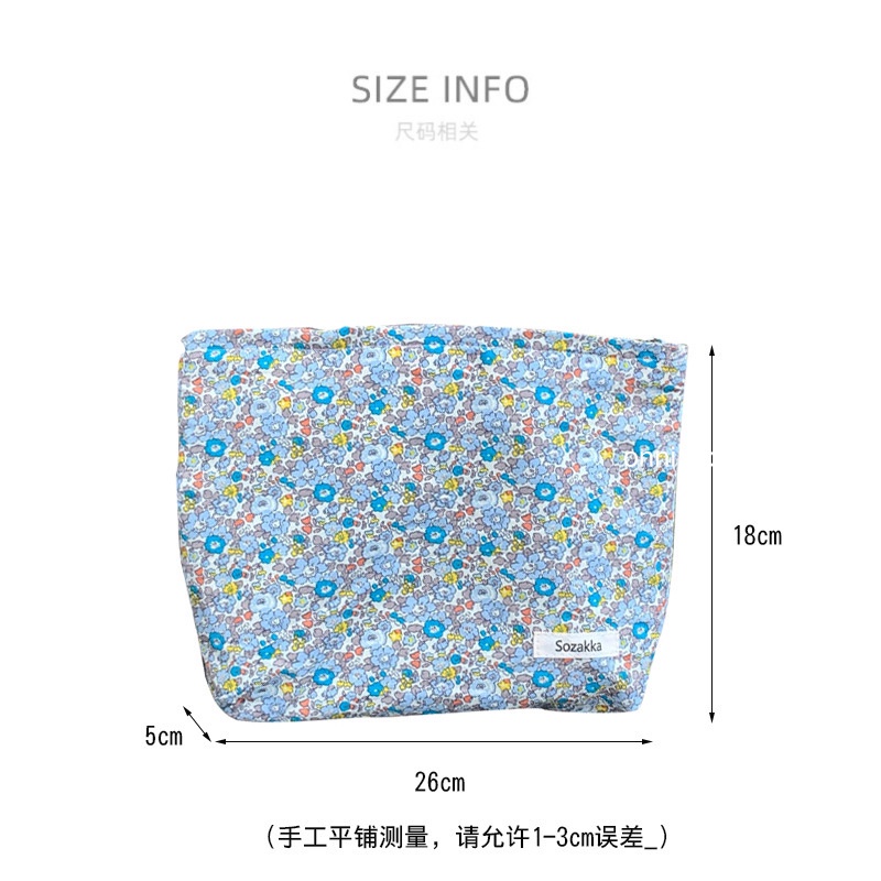 Túi đựng mỹ phẩm cầm tay in hoa nhỏ xinh | BigBuy360 - bigbuy360.vn