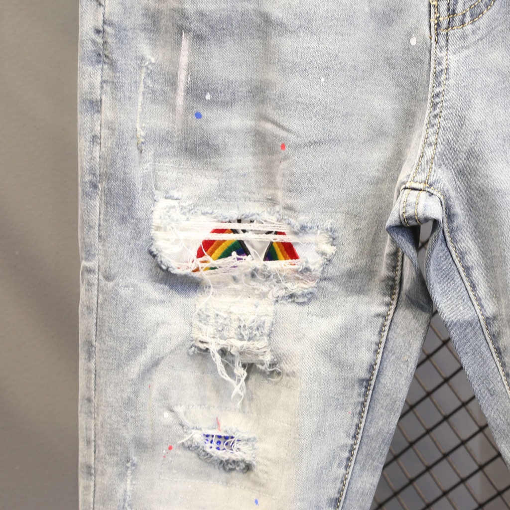 Quần Jean Dáng Ôm Kiểu Rách Cá Tính Trẻ Trung Cho Nam