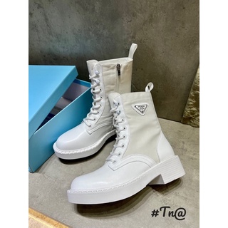 Boot da prada đan dây mai phương bùi