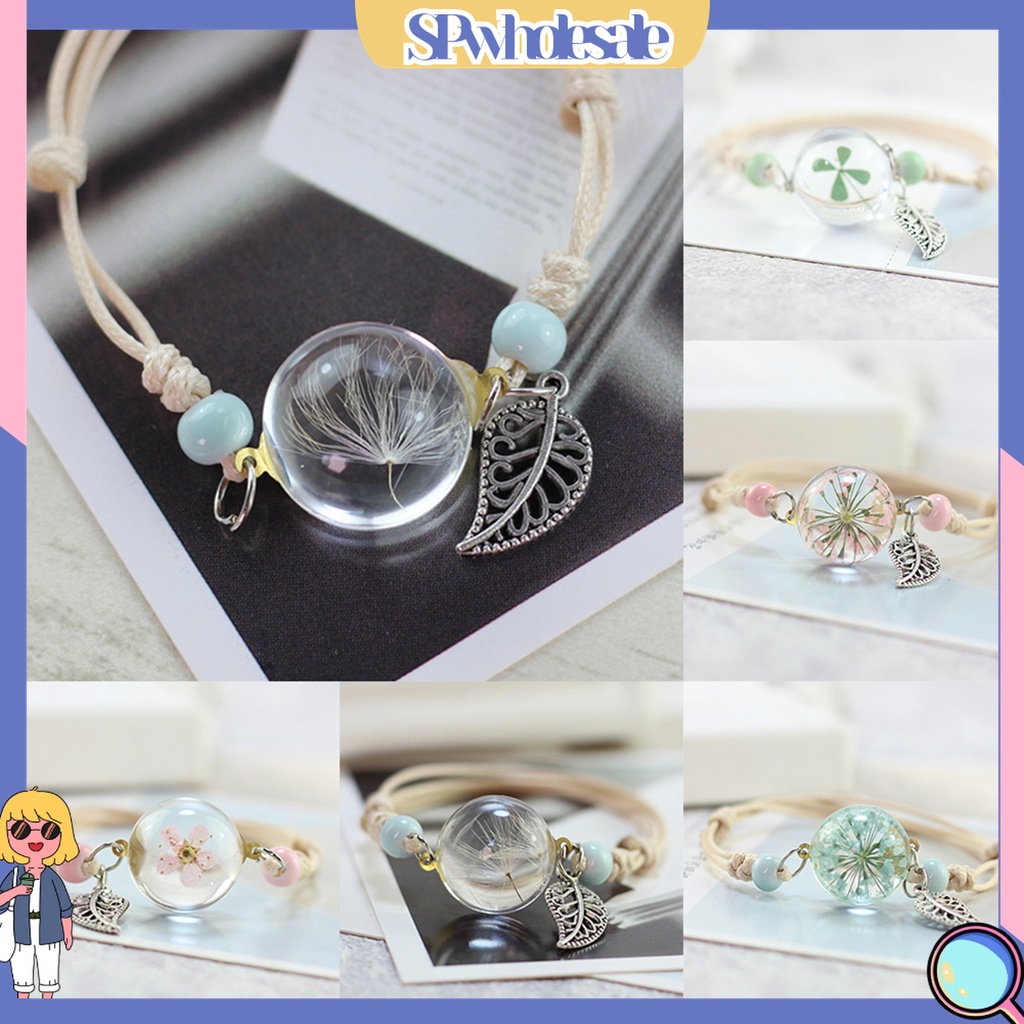 Vòng tay mặt quả cầu thủy tinh chứa hoa khô thời trang