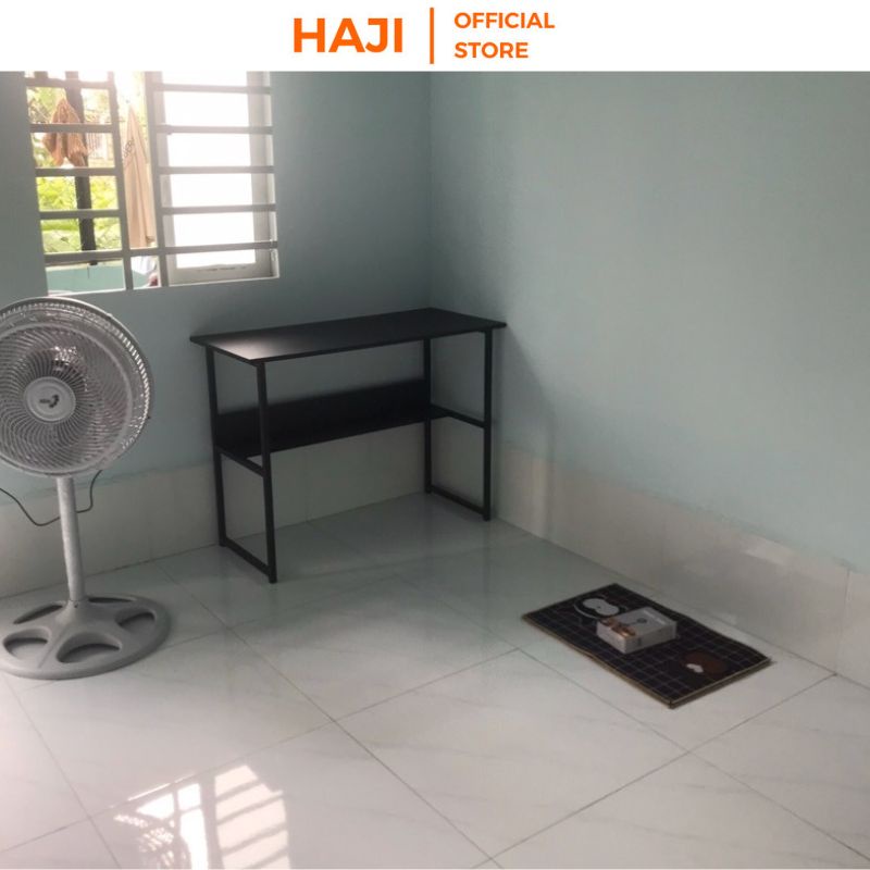 Bàn văn phòng dài 1m hiện đạiBàn làm việc tại nhà HAJI có kệ tiện dụng khung sắt sơn tĩnh điện chống gỉ chịu lực tốt C17