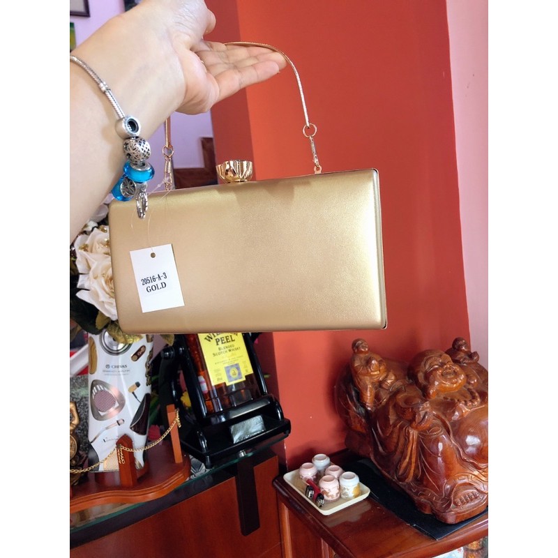 Cốp đi tiệc đính hoa nhún