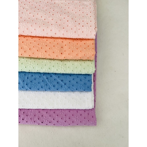 vải thô thêu đục lỗ màu pastel