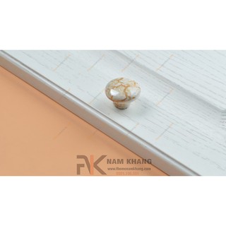 Núm cửa tủ sứ vân NK044 (Màu Sứ)