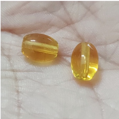 1 viên lu thống size 8x12mm đá thuỷ tinh bóng đẹp màu vàng đậm