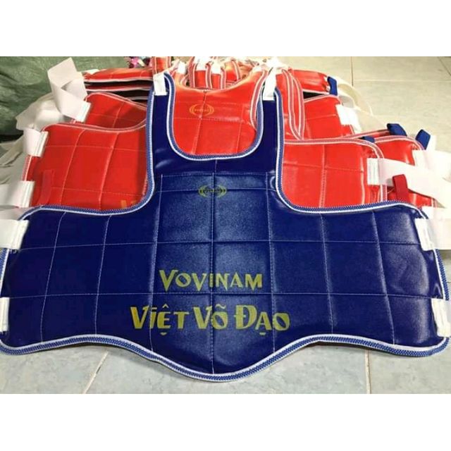 GIÁP THÂN VÕ VOVINAM (cặp) được may từ da simili PU cao cấp bền đẹp một mặt xanh và mặt đỏ