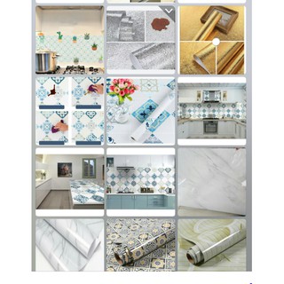Một cuộn giấy dán bếp ngang 0.6 mét dài 3 mét ( nhiều mẫu) có keo sẵn