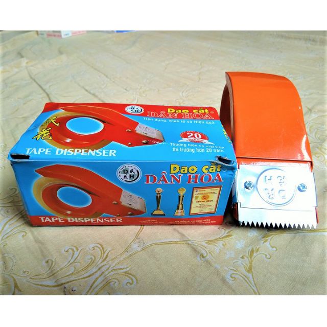 Dao cầm tay cắt băng dính  Dân Hoa bằng sắt