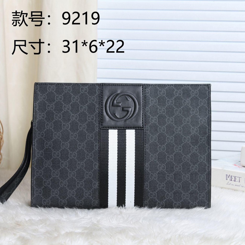 Túi da cầm tay Gucci khóa kéo kiểu dáng sành điệu sang trọng