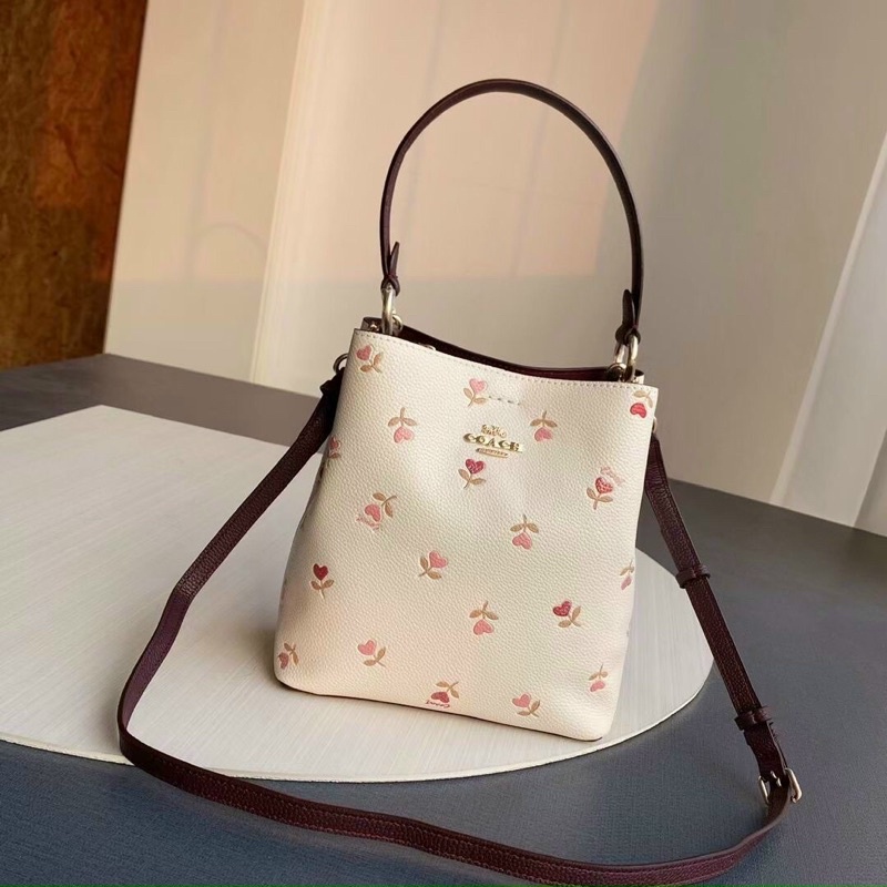 Túi Coach bucket hoa xinh size nhỏ