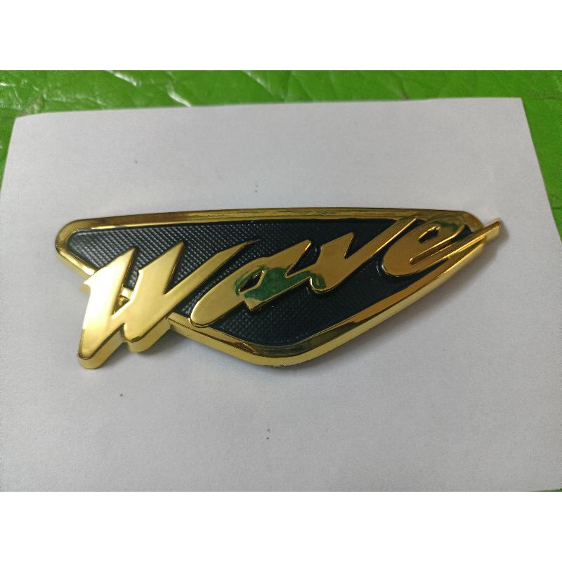 Bộ lộ gô nổi dán mặt nạ trứớc xe Wave crôm vàng New