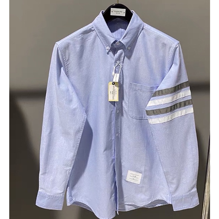 Áo sơ mi thom browne xanh viền 4 sọc trắng xám