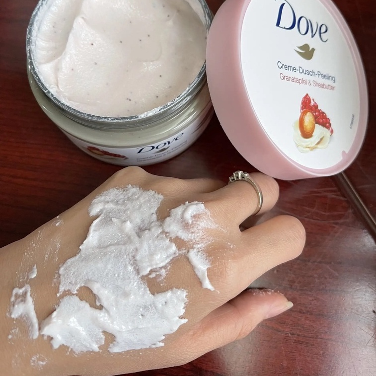 Kem tẩy da chết body Dove giúp tẩy tế bào chết chăm sóc da chiết xuất bơ hạt mỡ và hạt lựu 225ml | BigBuy360 - bigbuy360.vn