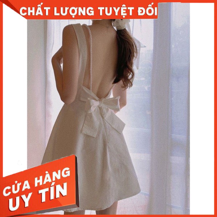 HÀNG CAO CẤP -   Đầm trắng hở lưng cột nơ dây chuỗi nhẹ nhàng xinh xắn  - Hàng Cao Cấ