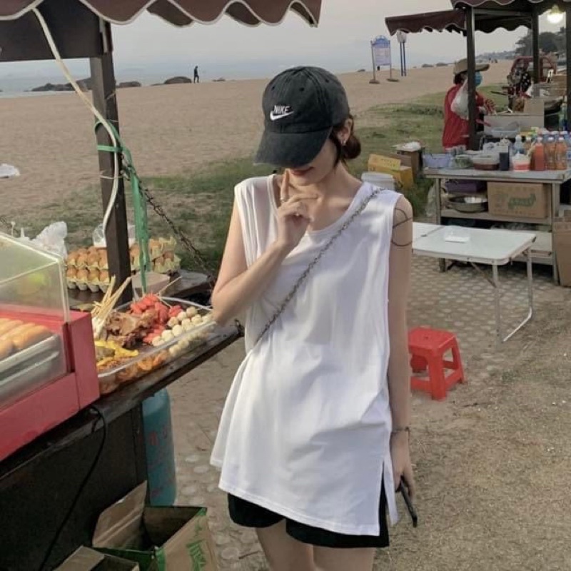 Áo ba lỗ sát nách trơn nữ oversize form rộng giấu quần xẻ tà - Order taobao quảng châu