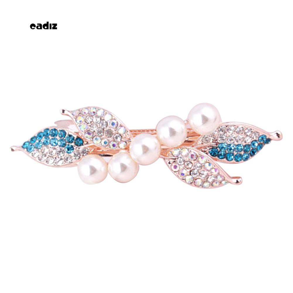 Kẹp tóc nơ đính hạt giả ngọc trai