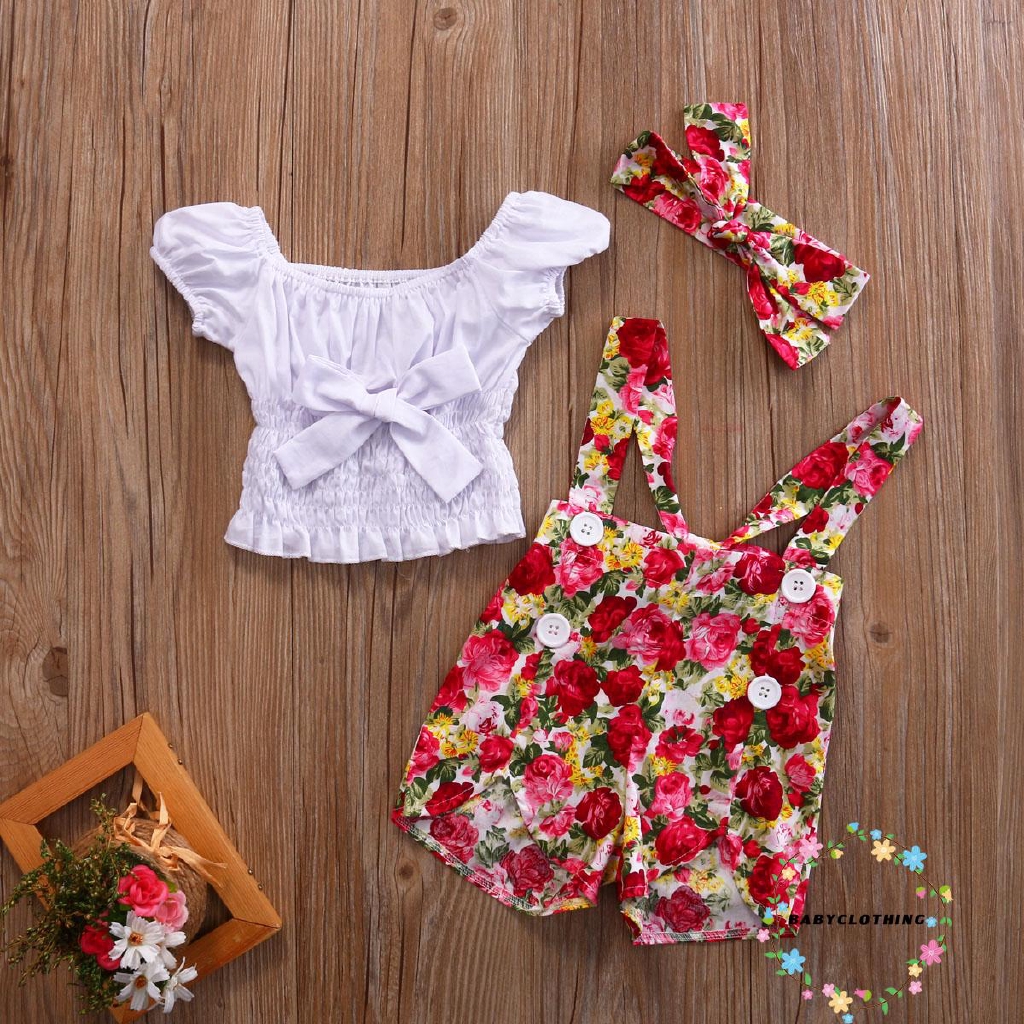 Bộ đồ gồm áo croptop/quần ngắn in hoa và băng đô xinh xắn dành cho bé gái