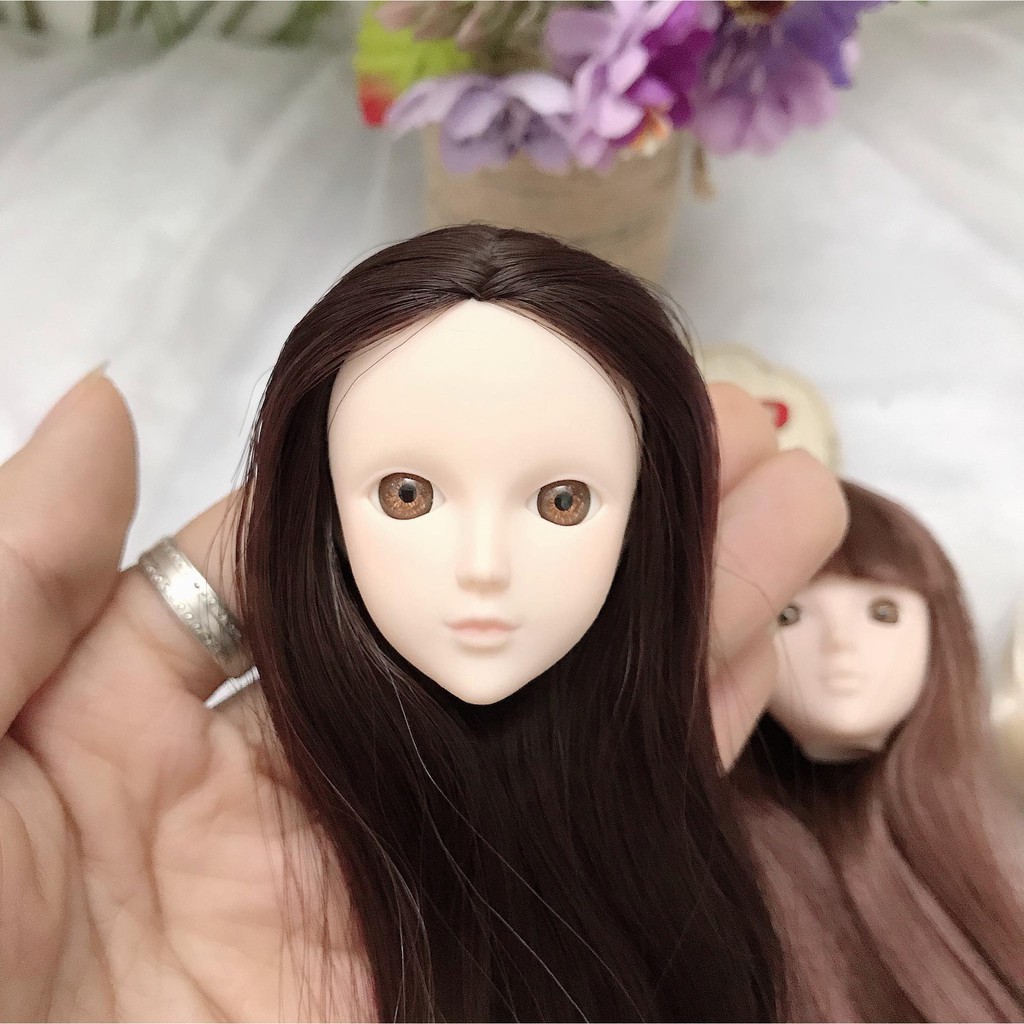 Đầu xinyi mắt gắn chưa faceup có tóc