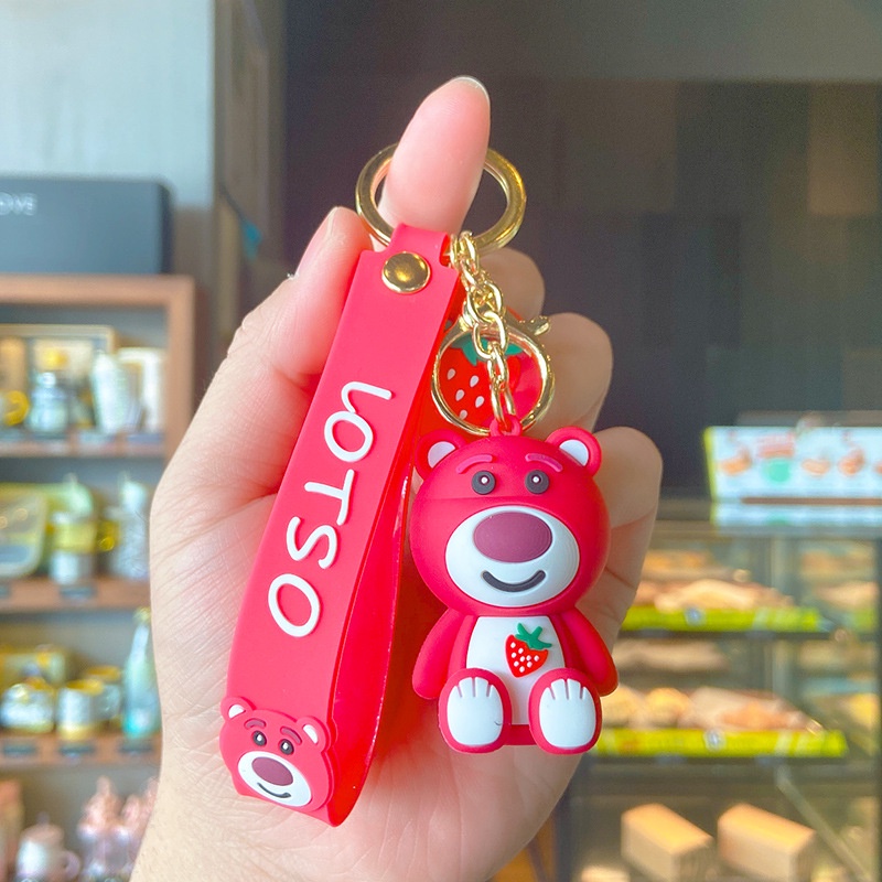 Móc Chìa Khóa Bằng PVC Hình Gấu Và Quả Dâu Dễ Thương