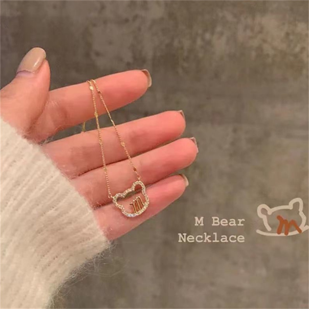 Vòng cổ mặt hình gấu và chữ M