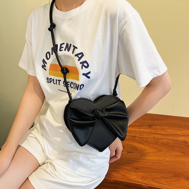 Túi đeo chéo vai IELGY đính nơ hình trái tim cá tính dành cho nữ