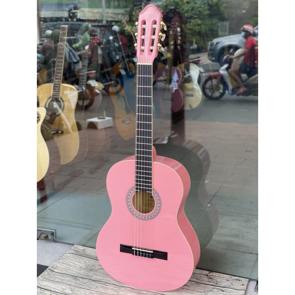 Guitar classic EKO CS10 màu hồng phấn xinh xắn