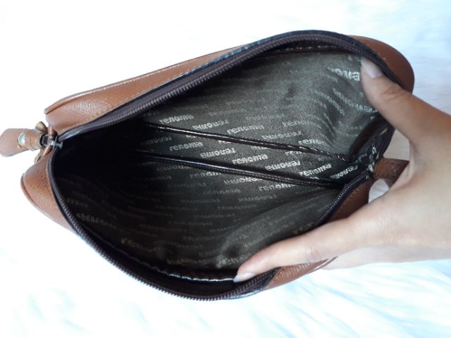 Túi cầm tay da thật