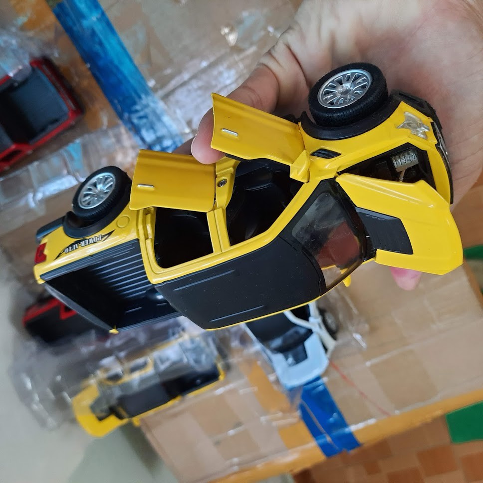 Mô hình xe ô tô ford ranger 1:32 jackie kim đồ chơi trẻ em làm bằng kim loại xe chạy cót mở được cửa có đèn và âm thanh