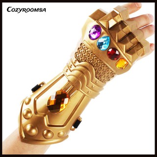 Găng tay vô cực hóa trang nhân vật thanos trong phim Avengers bàn sáng