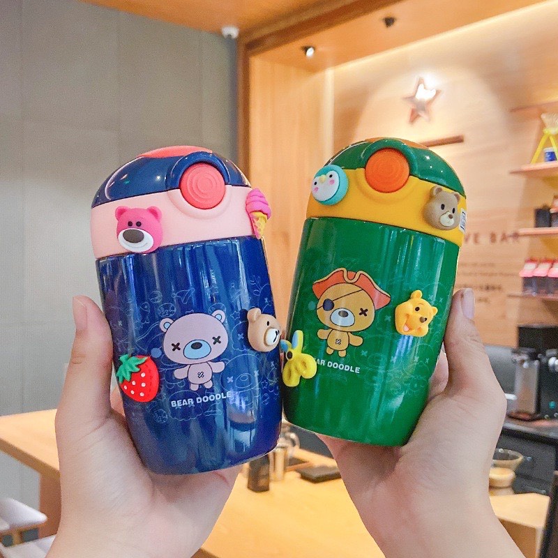Bình nước giữ nhiệt cao cấp họa tiết hoạt hình dán sticke kèm dây đeo