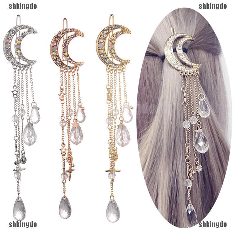 Kẹp tóc hình mặt trăng đính pha lê phối tua rua dài thời trang