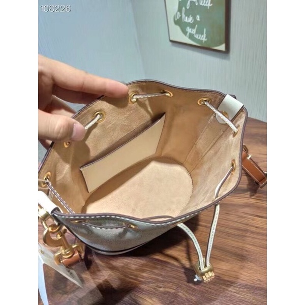 Túi Tory burch T MONOGRAM PERFORATED LEATHER BUCKET BAG❤code 80768❤️