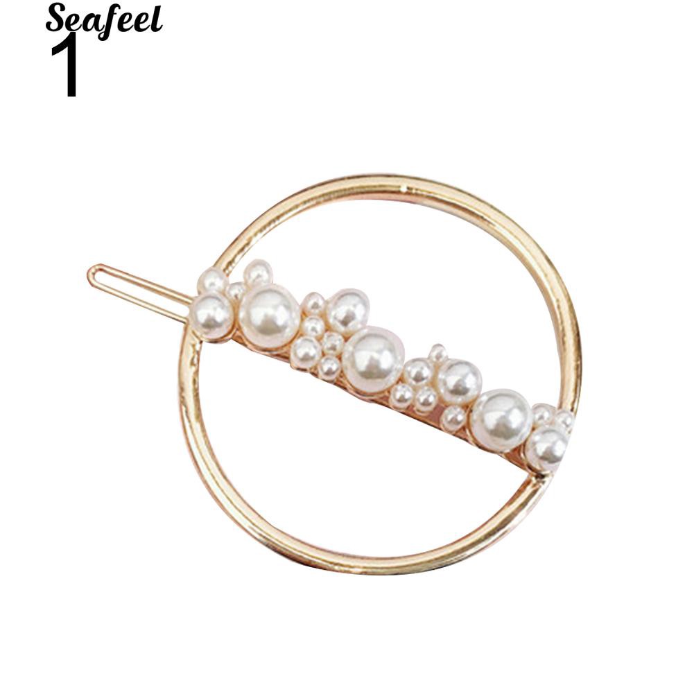 Kẹp tóc kim loại hình trăng sao đính ngọc trai giả