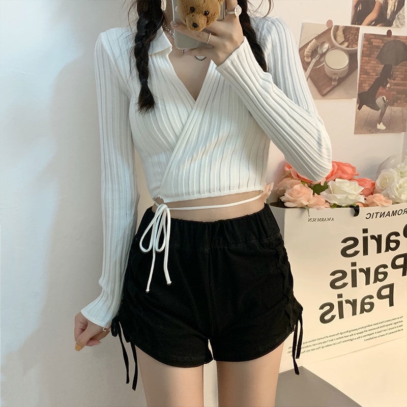 Áo sweater nữ IELGY dài tay thắt chéo cổ chữ V dáng ngắn màu trơn