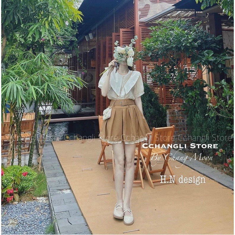 Set bộ lẻ GUU áo sơ mi cổ bèo nhọn màu be kèm chân váy xếp ly dáng ngắn màu nâu tây tôn da phong cách hàn quốc