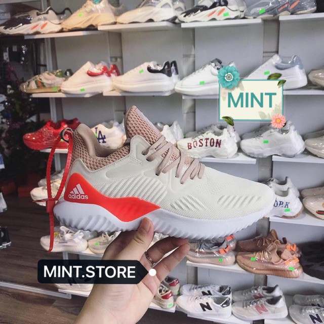 (Video cận cảnh) Giày thể thao sneaker alphabounce kem cam