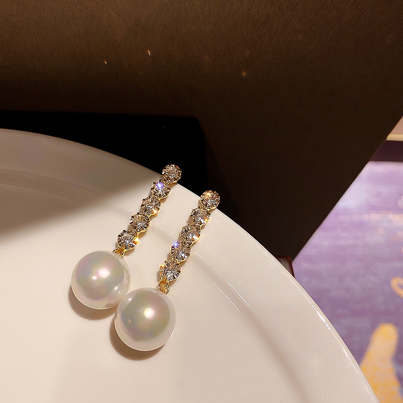 Khuyên tai tua rua dáng dài đính đá ngọc trai độc đáo