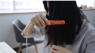 Máy là uốn tóc