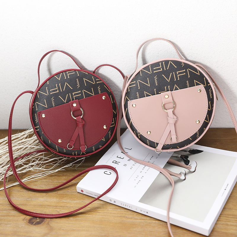 Túi đeo chéo dáng tròn nhỏ sành điệu cho nữ IELGY