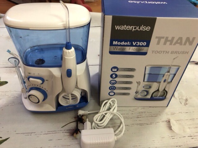 Máy tăm nước V300 Waterpulse vệ sinh răng miệng