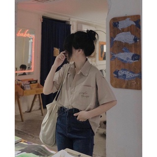 Sơmi túi ngực viền trái