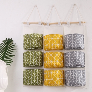 Túi treo tường 3 ngăn bằng cotton lanh đựng mỹ phẩm/ đồ chơi trẻ em tiện dụng