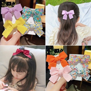 Set 2 kẹp nơ vải điệu đà xinh xắn cho bé .