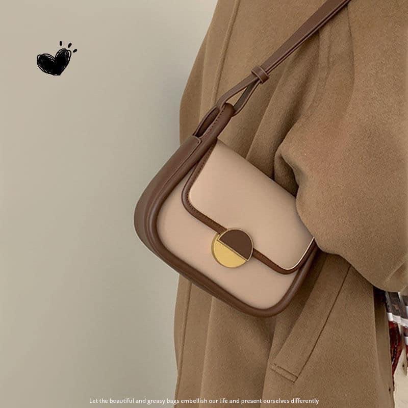 TÚI ĐEO VINTAGER VIỀN NÂU KHOÁ TRÒN